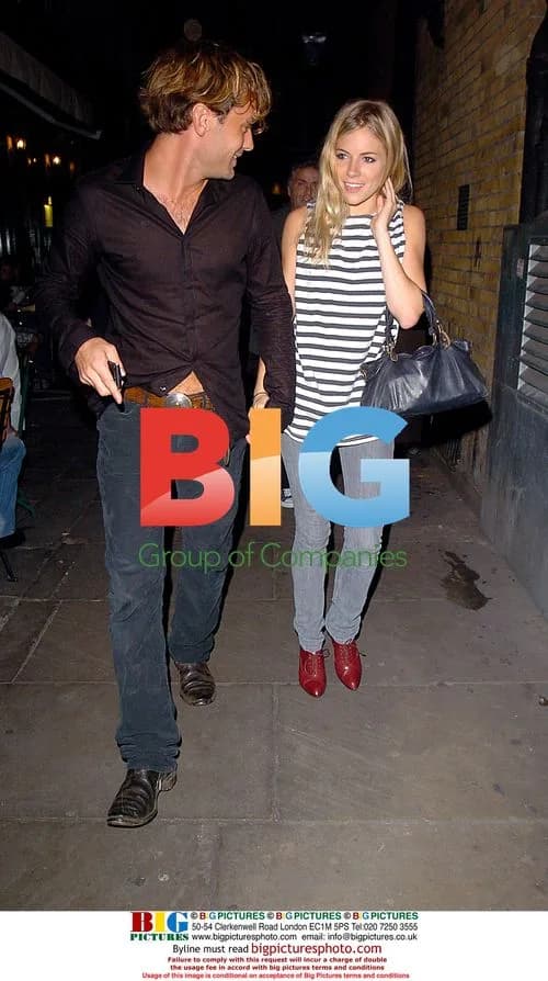 Jude Law and Sienna Miller leave theater