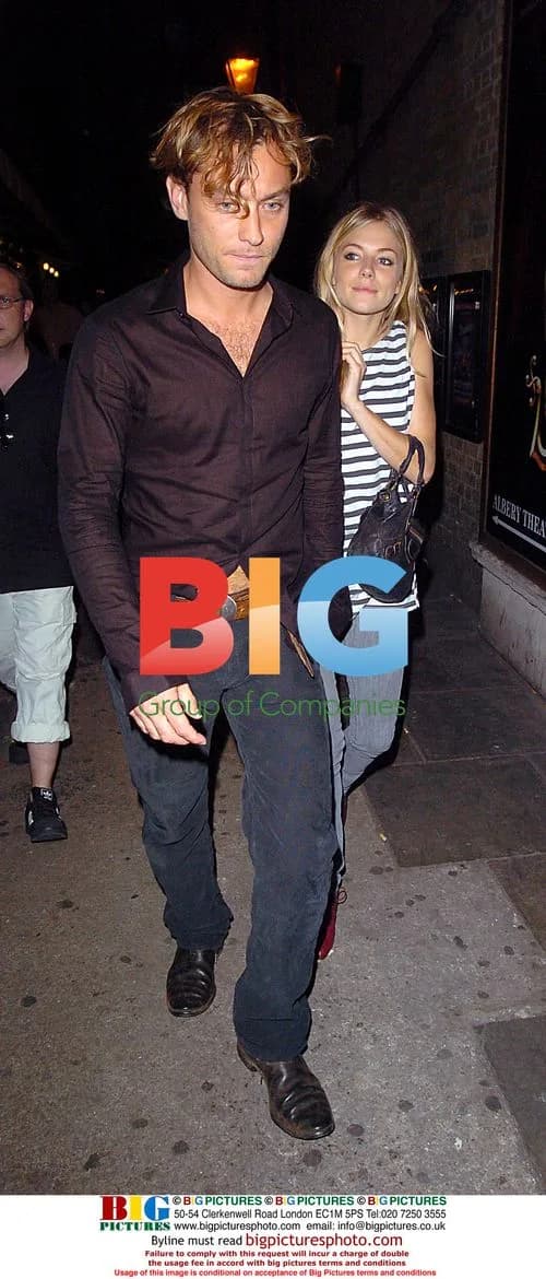 Jude Law and Sienna Miller leaving theatre
