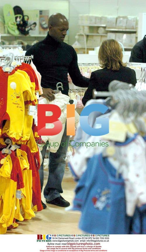 Fame Academy's Kevin Adams picks up food