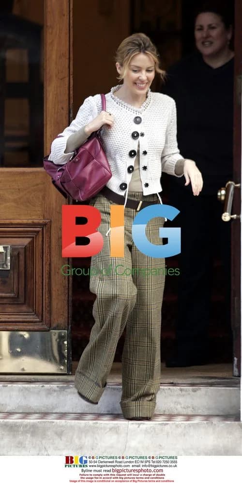 Kylie Minogue Smiles Leaving for Rehearsals
