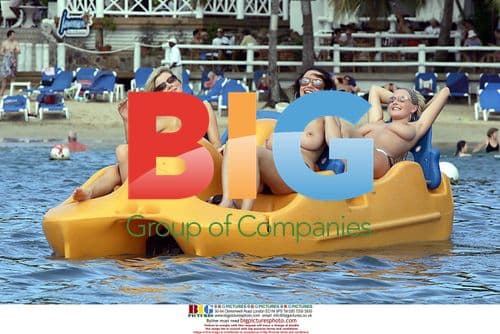 Glamour girls enjoying Caribbean holiday