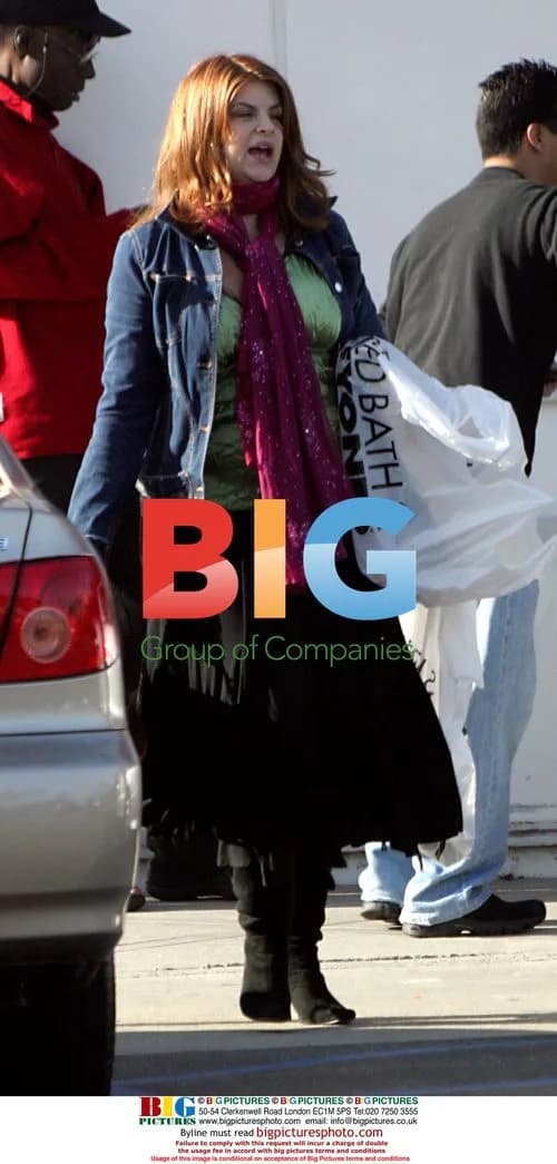 Kirsty Alley Leaves Store with Shopping Bags