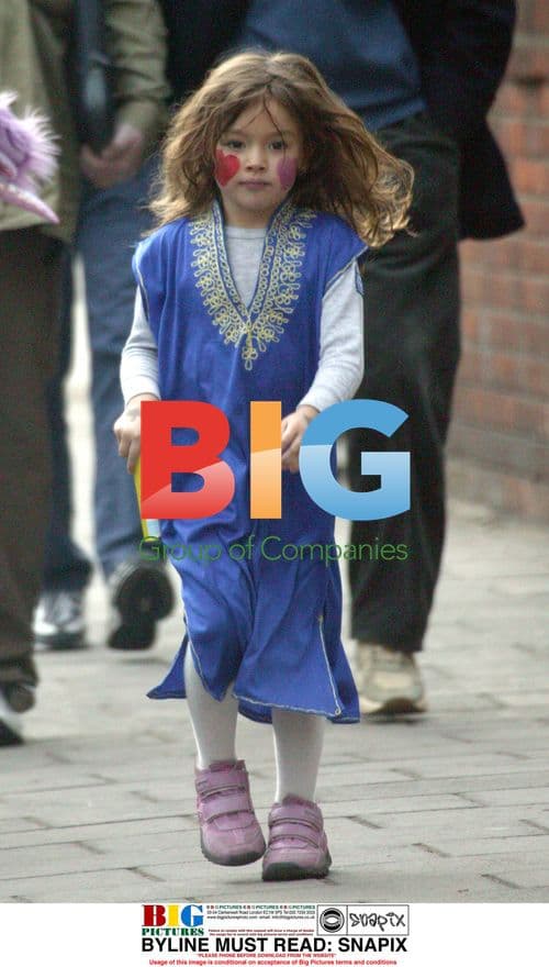 Missy Albarn dancing down the road