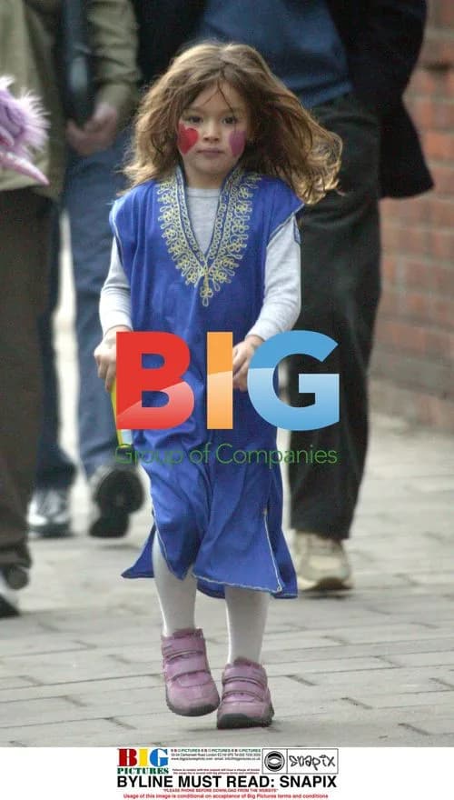 Missy Albarn dancing down the road