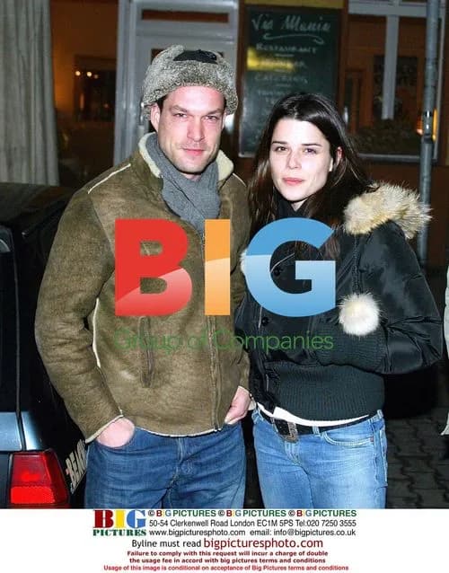 Neve Campbell with mystery man in Berlin