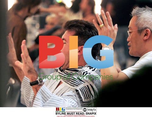 Simon Cowell Gets Hair Cut in London