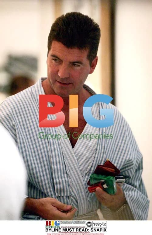 Simon Cowell Gets Hair Cut in London