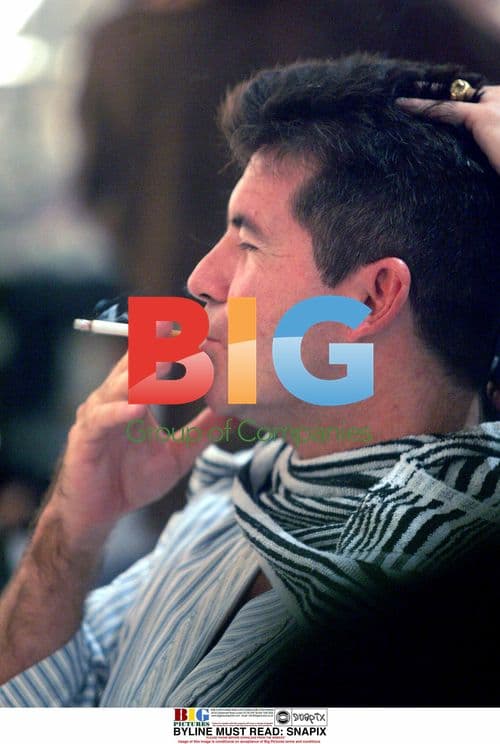 Simon Cowell Gets Haircut in London