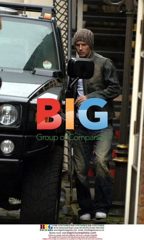 David and Victoria Beckham Leaving Manchester Restaurant