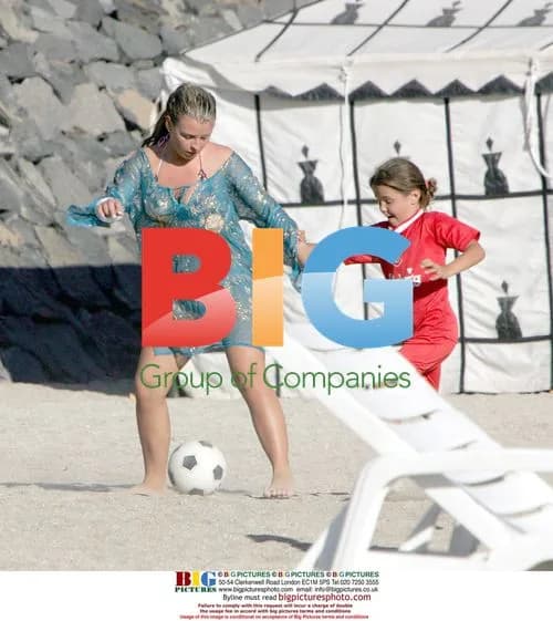 Coleen McLoughlin Plays Football on Holiday