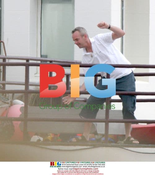 Fatboy Slim Messing Around on Balcony