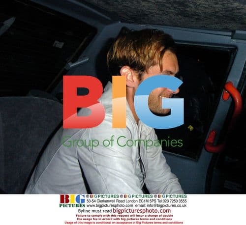 Jude Law and Sienna Miller leave "The Jacket" screening