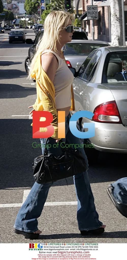 Tara Reid and mystery man shopping in Beverly Hills