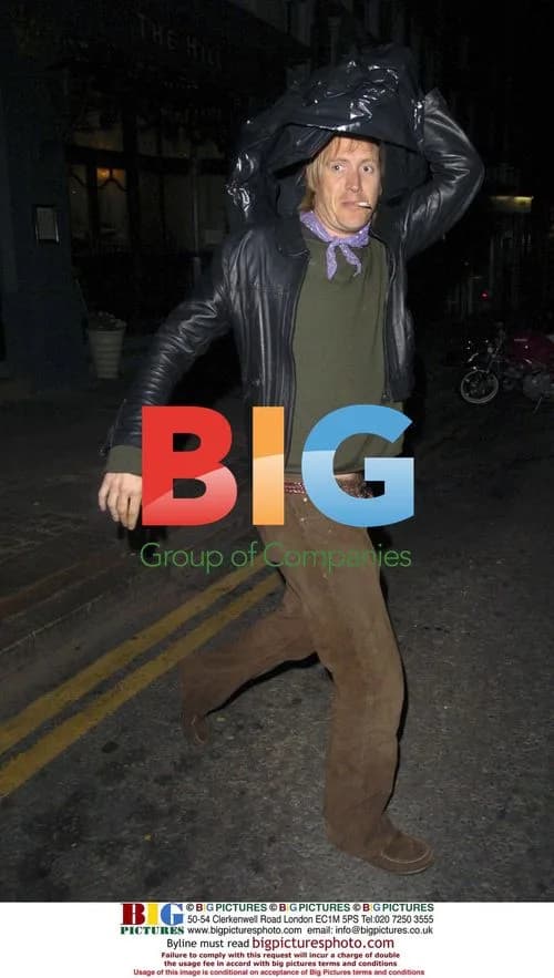 Rhys Ifans disguises himself as bin bag leaving pub