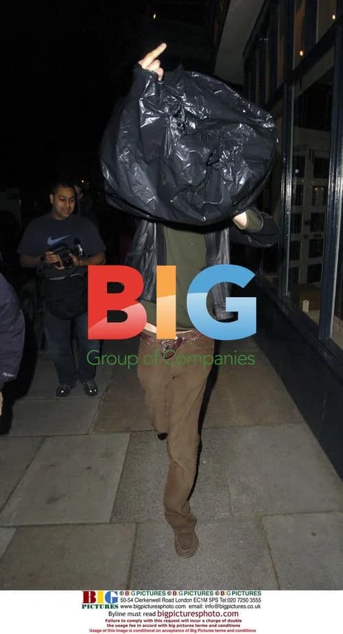 Actor Rhys Ifans Disguises Himself as Bin Bag