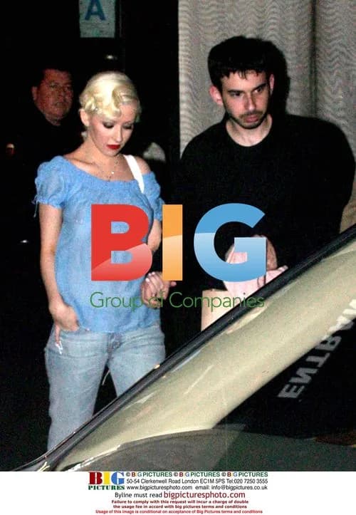 Christina Aguilera leaves restaurant with fiancé
