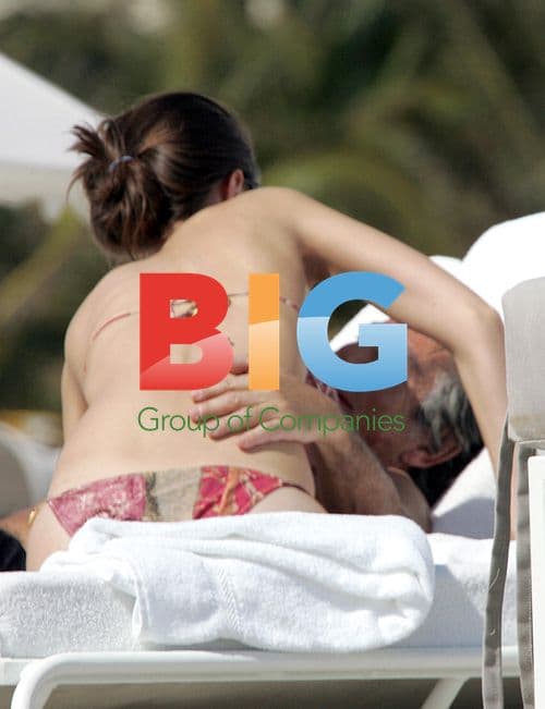 Roberto Cavalli with Young Lady in Miami Beach