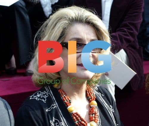 Catherine Deneuve at Yves Saint Laurent Fashion Show