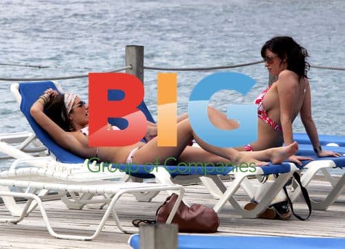 Glamour Models Lucy Pinder and Sophie Howard Cool Down in St Lucia