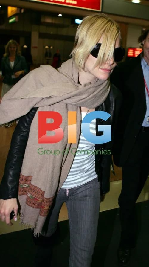 Sienna Miller Arrives at Heathrow Airport