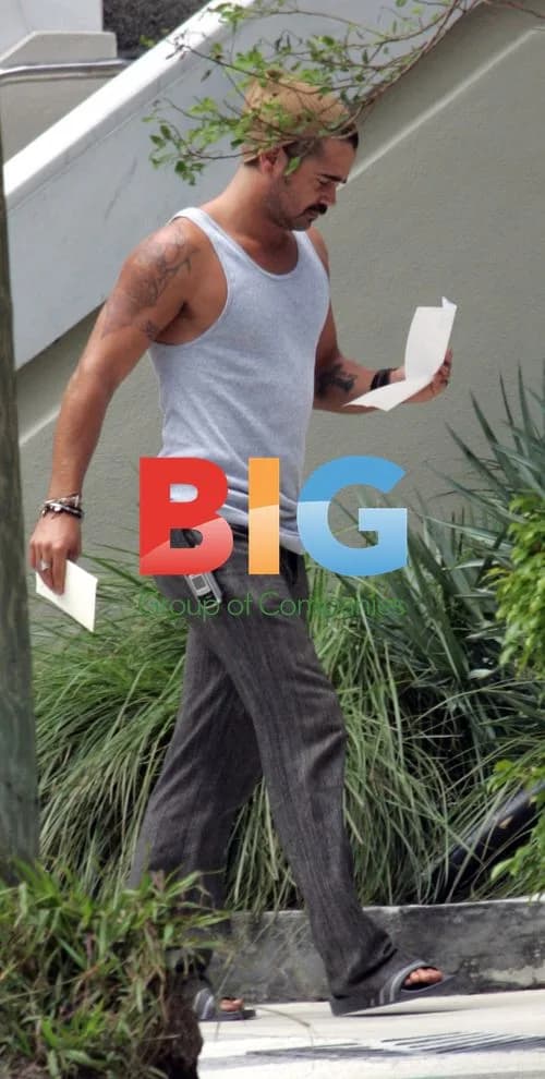 Colin Farrell Reading Mail in Miami