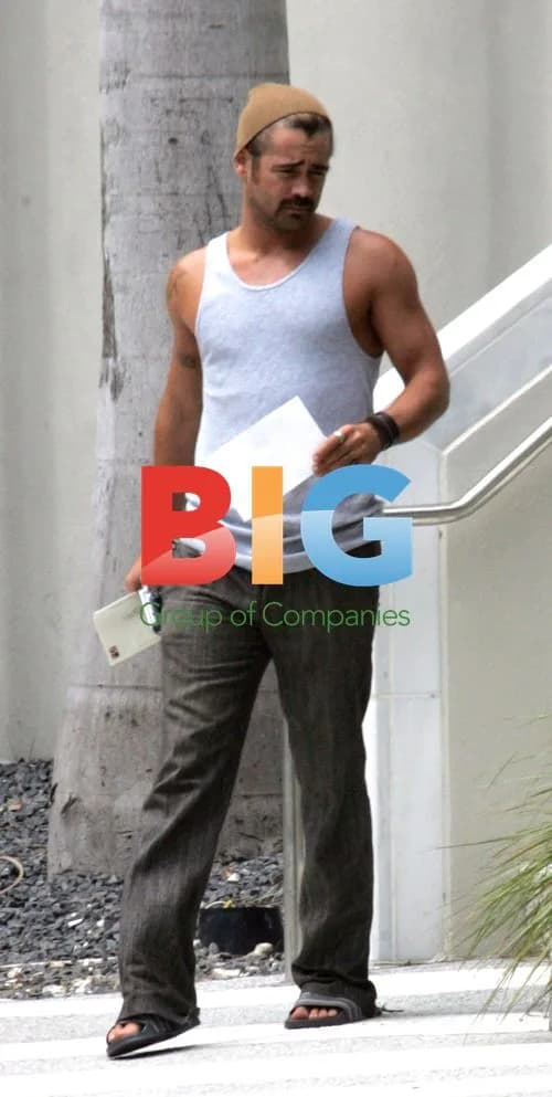 Colin Farrell reading mail