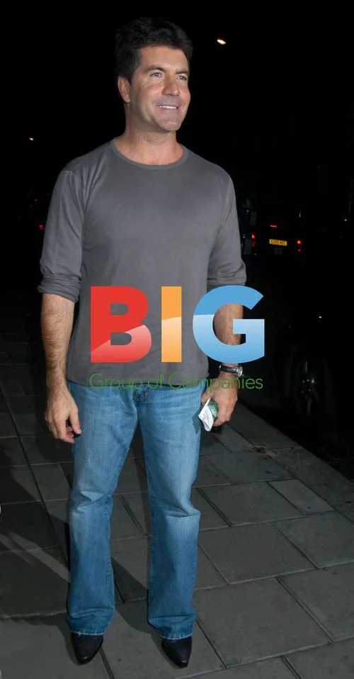 Simon Cowell and Louis Walsh Leave London Restaurant