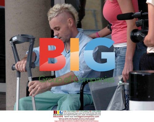 Emma B leaving hospital with Brian Harvey