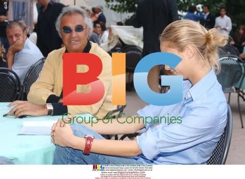 Flavio Briatore with Mystery Woman