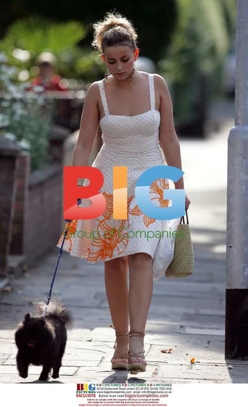 Charlotte Church Relaxes in Park with Dog