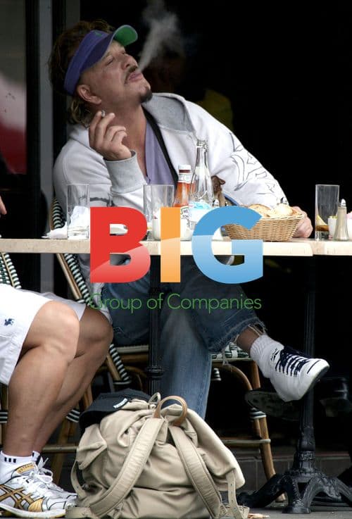 Mickey Rourke Enjoys Lunch with Friends and Pet