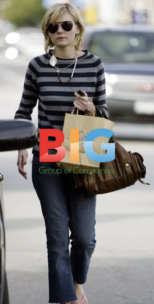 Kirsten Dunst Carrying Paper Bag in Beverly Hills