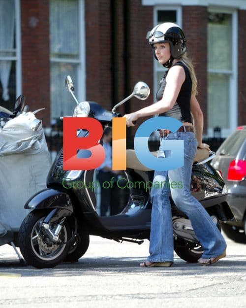 Jane Krakowski with Vespa in London