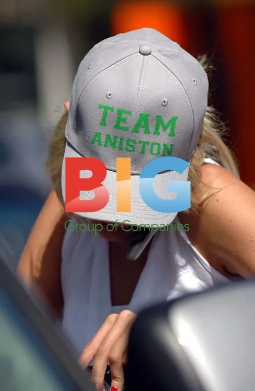 Kimberly Stewart Wears 'Team Aniston' Cap