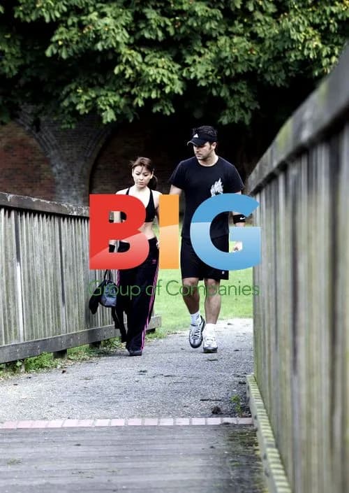 Lisa Scott-Lee and Johnny Shentall exercise in Windsor park