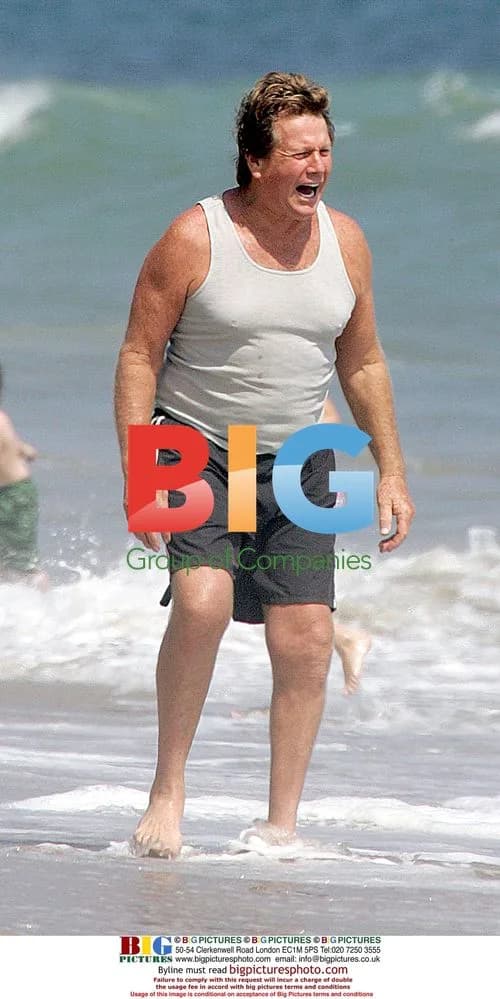 Ryan O'Neal at beach house on 4th of July