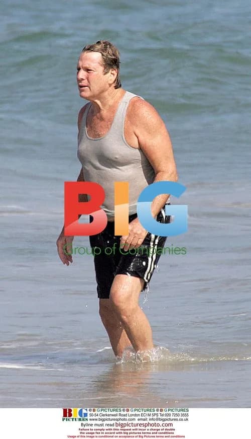 Ryan O'Neal plays Frisbee at beach house