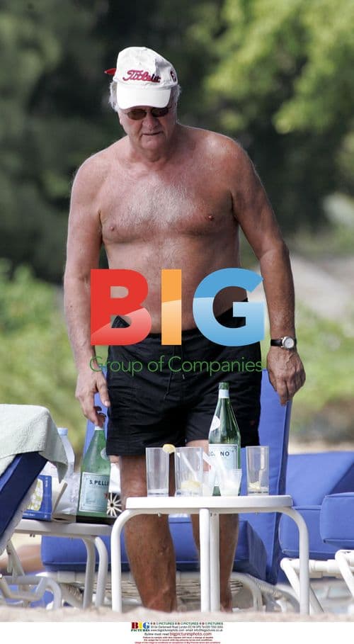 Ron Atkinson Relaxing on Barbados Beach