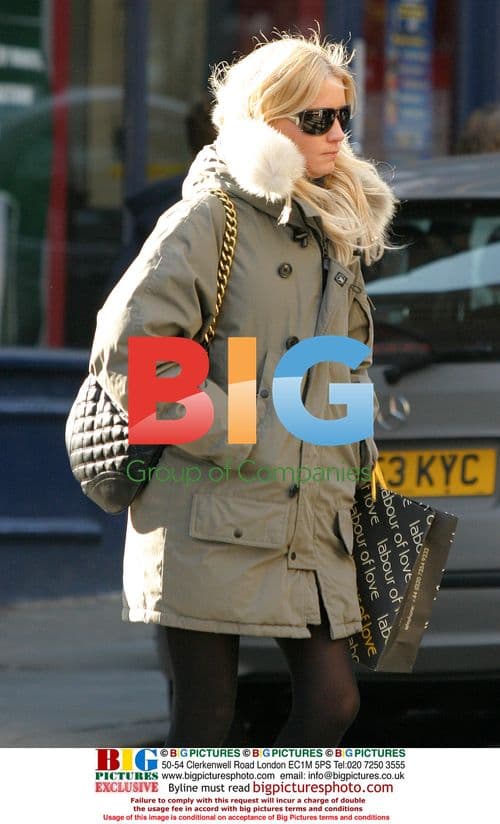 Denise Van Outen Looks Gloomy Shopping in London