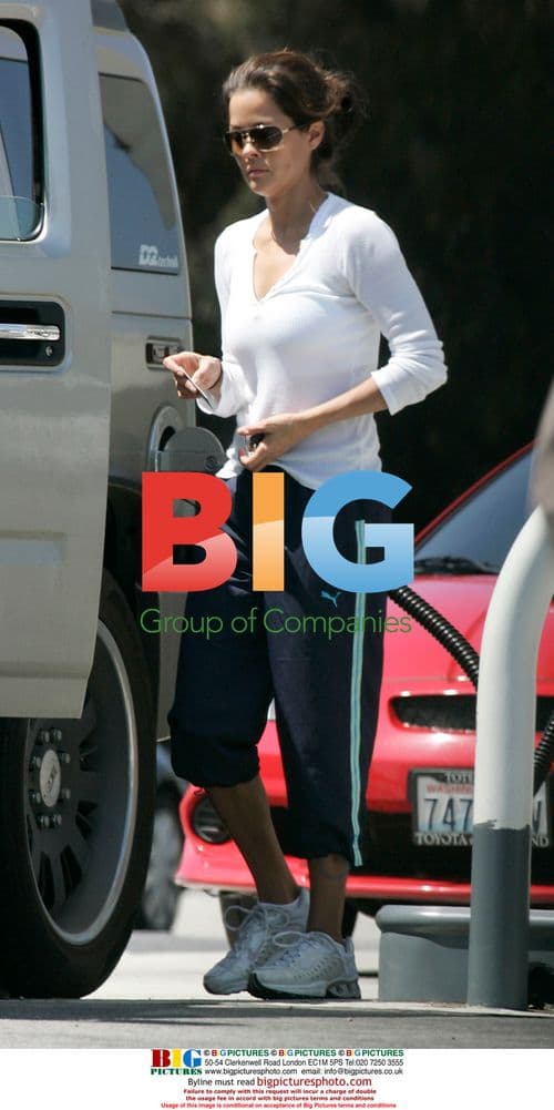 Brooke Burke Pumps Gas in Malibu