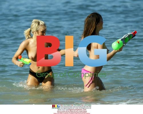 Models Kayleigh Pearson and Natasha Mealey play in the water