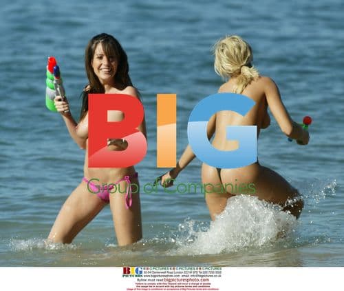 Models Kayleigh Pearson and Natasha Mealey play in the sea