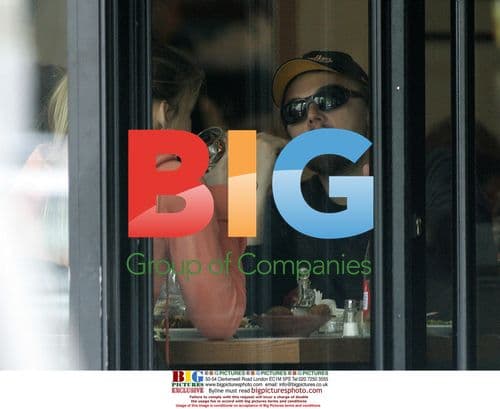 DiCaprio and Rafaeli Stroll in Paris