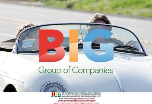 Kurt Russell checks Porsche on Sunset Blvd