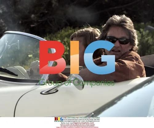 Kurt Russell Checks Porsche on Sunset Blvd.