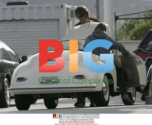Kurt Russell Checks Porsche on Sunset