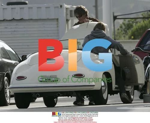 Kurt Russell Checks Porsche on Sunset