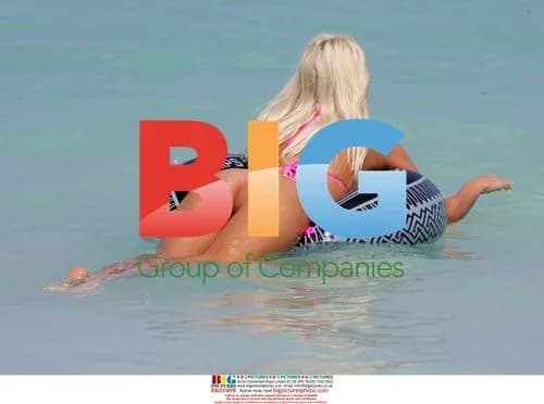 Model Emma B plays in the Caribbean