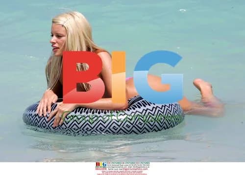 Model Emma B plays in the Caribbean