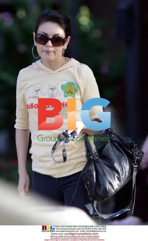 Macaulay Culkin and Mila Kunis Out With Family